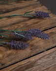 Artificial lavender spray with hyper-realistic purple blooms, bendable stems, and natural textures for home decor by sostter at brixbailey.com
