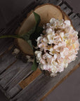 Hand-painted cream hydrangea stem with blush accents, realistic plastic floral decor for home or wedding centerpieces by Sostter at brixbailey.com