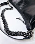 Black Leather Handbag with Metallic Accents, Crossbody