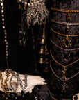 Gold Tethered Remains Bones Necklace