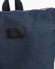 Navy Blue Backpack – Stylish, Roomy & Laptop-Friendly by Muni at www.brixbailey.com