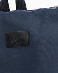 Navy Blue Backpack – Stylish & Spacious for Everyday Use by Muni at www.brixbailey.com
