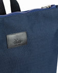 Navy Blue Backpack – Stylish & Roomy for Essentials & Laptops by Muni at www.brixbailey.com