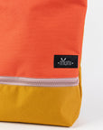 Vibrant Orange+Yellow Backpack – Waterproof & Durable by Muni at www.brixbailey.com