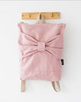 Chic Pink Denim Backpack with Bow – Laptop Friendly by Muni at www.brixbailey.com