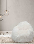 Luxury handmade Icelandic sheepskin beanbag chair, premium longhair fur, white teardrop style, best-selling comfort furniture by Wildash London at brixbailey.com