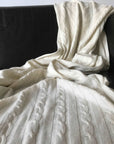 Whipped Cream cashmere throw blanket by Wildash London in heritage cable knit at www.brixbailey.com