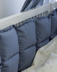 Premium organic cotton kapok bumper in forest lake blue, soft hypoallergenic natural fiber, breathable heat-regulating, fits standard 60x120cm cot beds by Ella James at brixbailey.com
