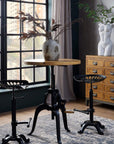Adjustable industrial bistro table with weathered wood top and black metal frame, perfect for dining or entertaining. by Sostter at brixbailey.com