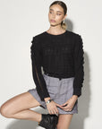 Luxury black ruffled blouse with eyelet fabric, puff sleeves, lace inserts, romantic and edgy style, premium cotton top by GILD at brixbailey.com