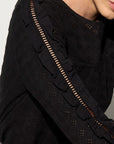 Luxury black ruffled blouse with lace inserts, puff sleeves, and eyelet fabric, edgy romantic top by GILD at brixbailey.com