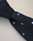 navy blue skinny knitted tie with light blue polka dots