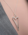 SILVER HOLLOW HEART NECKLACE*