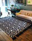 Premium monochrome flat weave rug, handmade in India with pure wool, stylish geometric design, neutral tones, large edge tassels, 170x240cm by Maria Starling Design at brixbailey.com