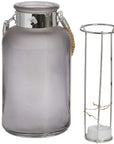 Frosted grey glass lantern with star-like LED glow, rope handle, modern rustic design for indoor or outdoor ambiance. by sostter at brixbailey.com