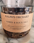 Luxury marine candle with amber, rock salt, driftwood, clean ozonic fragrance, fresh sea breeze scent, best-selling home decor by Ralph's Orchard at brixbailey.com