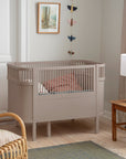 Luxury Jetty Beige baby and junior cot bed, premium height-adjustable Sebra birch wood design for ages 0-8 by Ella James at brixbailey.com