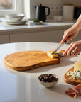 Olive Wood Medium Cutting Board with Handle 39 Handmade Olive Wood Round Freeform Charcuterie Board with Handle | Large Live Edge Cheese & Antipasti Serving Board | Bold Natural Grain | 33–46 cm