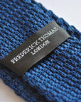 navy blue skinny knitted tie with powder pink tip