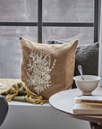 Luxury Ila Cushion in olive brown cotton with hand-embroidered floral design, warm and inviting home decor accent by Ella James at brixbailey.com