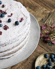 Luxury glazed stoneware cake stand, elegant blue-grey centerpiece, 32cm diameter, premium handcrafted unique design by Ella James at brixbailey.com