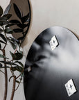 Luxury Danish rose gold tint mirror, classic design with warm atmospheric lighting by Ella James at brixbailey.com
