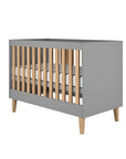 Grey Baby Cot with Adjustable Height Options