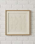 White Feather Artwork in Beaded Wood Frame