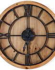 bold wooden wall clock with rich brown wood and grey numerals in dramatic lighting