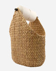 Luxury water hyacinth toilet paper holder, handwoven modern bathroom organizer with wooden handle, stylish natural decor by Ella James at brixbailey.com