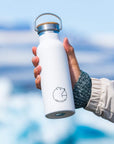 Premium Arctic Bottle, double-wall vacuum-insulated stainless steel water bottle, eco-friendly bamboo lid, keeps drinks hot or cold, leak-proof, BPA-free by Arcticus at brixbailey.com