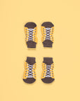 Luxury non-slip dog socks, paw protectors for clean dry paws, best-selling cotton blend pet socks for traction on slippery floors by Body and I at brixbailey.com