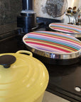 Rainbow Chef Pad for Aga Range Cooker, premium heat-saving hob cover, handmade UK recycled cotton, stylish rainbow design by Maison Elhoria at brixbailey.com