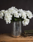 Luxury artificial hydrangea bouquet in creamy off-white, ultra-realistic plastic blooms with natural tonal variations by sostter at brixbailey.com