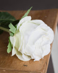 Lifelike white artificial rose stem with realistic petals, perfect for home decor or bouquets by sostter at brixbailey.com