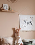 Tiger embroidery wall hanging, minimalist decor, premium handcrafted tiger art, Nobodinoz Landscape collection, stylish bedroom or playroom decor by Ella James at brixbailey.com