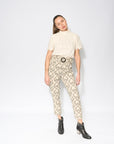 Premium tapered pleat pants with high waist, detachable belt, and front-back pockets, crafted from 100% cotton IKAT fabric by GILD at brixbailey.com