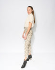 Premium tapered pleat pants with high waist, double pleats, detachable belt, and pockets, crafted from 100% cotton IKAT fabric by GILD at brixbailey.com