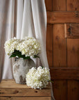 Lifelike white hydrangea arrangement in antique white vase, realistic plastic flowers for home decor by sostter at brixbailey.com