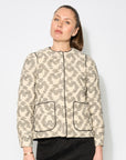 Luxury quilted ikat jacket, premium 100% cotton, stylish contrast piping, soft and cozy, modern versatile wardrobe essential by GILD at brixbailey.com