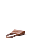 Premium Alexia small hobo bag in smooth caramel leather, elegant and sophisticated design with silver hardware, best-selling handbag by Bob Oré at brixbailey.com