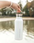 Premium Arctic Bottle, double-wall vacuum-insulated stainless steel, keeps drinks hot or cold, eco-friendly bamboo lid, leak-proof, BPA-free by Arcticus at brixbailey.com