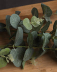 Lifelike 70cm artificial eucalyptus spray with silver-green leaves for elegant home decor by sostter at brixbailey.com
