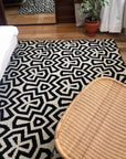 Luxury monochrome flat weave rug, handmade in India, premium pure wool, geometric design, stylish tassels, trending neutral tones by Maria Starling Design at brixbailey.com