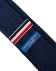 navy blue knitted tie with embroidered dog design