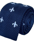 navy blue knitted tie with white embroidered fleur de lis lys design