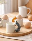 Cat Egg Cup (ORANGE) – A Playful Ceramic Breakfast Object | 4am Product Design