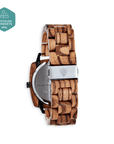 Luxury vegan wood watch for men, handcrafted from upcycled zebrawood, deep brown multi-tonal bezel and band, black watch face with day date dials by The Sustainable Watch Company at brixbailey.com