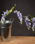 Lifelike artificial lilac wisteria blooms in cascading clusters, soft purple gradient petals, for home decor. by sostter at brixbailey.com