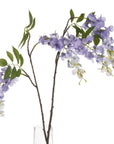 Lifelike artificial lilac wisteria with cascading clusters, soft purple gradient blooms on realistic plastic stems by sostter at brixbailey.com